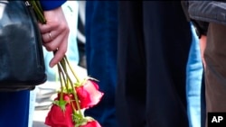 In this grab taken from footage provided by the ROSATOM press service, a military band prepares to attend the funerals of five Russian nuclear engineers killed by a rocket explosion in Sarov, Aug. 12, 2019. 