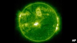 This image provided by NASA shows the Sun seen from the Solar Dynamics Observatory satellite on March 23, 2024. Space weather forecasters have issued a geomagnetic storm watch through March 25, 2024.