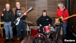 Members of the Finnish punk band Pertti Kurikan Nimipaivat are, from left, Kari Aalto, Sami Helle, Toni Valitalo and Pertti Kurikka, March 6, 2015. 