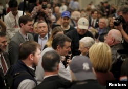 U.S. Republican presidential candidate and U.S. Senator Ted Cruz shakes hands with supporters during a conservative leadership project event in Columbia, South Carolina, Jan. 15, 2016.