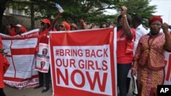 Scores of protesters marched chanting "Bring Back Our Girls" kidnapped by Boko Haram.