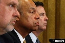 FILE - U.S. National Counterterrorism Center Director Nicholas Rasmussen, Homeland Security Secretary Jeh Johnson and FBI Director James Comey, left to right, testify before a House Homeland Security Committee hearing on Capitol Hill in Washington, July 14, 2016.
