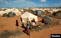 FILE - An aerial view shows part of Ifo camp, one of several refugee settlements in Dadaab, Kenya, Oct. 7, 2013. Dadaab had at least 235,000 registered refugee and asylum seekers as of January 2018, UN Refugee Agency reports. (Reuters)