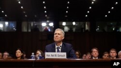 Supreme Court Justice nominee Neil Gorsuch arrives for his confirmation hearing before the Senate Judiciary Committee on Capitol Hill in Washington, March 20, 2017.