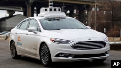 An Argo self-driving car is tested in Pittsburgh, Pennsylvania, Jan. 22, 2018. Argo is a company owned by Ford. 