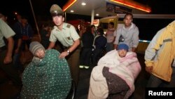 ប្រជាជន​ត្រូវបាន​គេជម្លៀស​ពីលំនៅដ្ឋាន​របស់​ពួកគាត់​បន្ទាប់ពី​មានការ​ប្រកាស​អាសន្ន​នៃគ្រោះ​ Tsunami ក្នុង​ទីក្រុង​ Antofagasta ខាង​ជើង​រដ្ឋធានី​ Santiago តាម​បណ្តោយ​ឆ្នេរ​មហាសមុទ្រ​ប៉ាស៊ីហ្វិក​ភាគខាងត្បូង​ (រូបថត​ថ្ងៃទី០១ ​ខែមេសា​ ឆ្នាំ២០១៤​)។