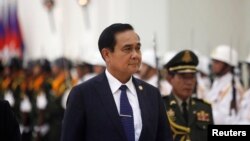 PM Thailand Prayuth Chan-ocha dalam kunjungan ke Phnom Penh (30/10). (Reuters/Samrang Pring)