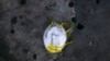 A face mask is discarded on a sidewalk during the coronavirus outbreak in Los Angeles, May 21, 2020. 