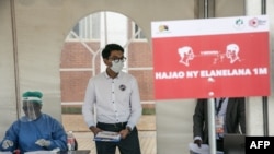 President of the Republic of Madagascar Andry Rajoelina attends a mass screening of patients suspected of being infected with the coronavirus, in Antananarivo, March 31, 2020. 