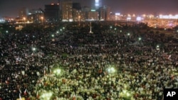 Pro-government supporters rally in Bahrain following a week of opposition protests