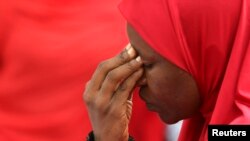 O'g'irlangan qizlarning ozod etilishini talab qilib chiqqan namoyishchilardan biri, Abuja, 12-may, 2014-yil.