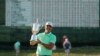Brooks Koepka poses with the winning trophy after the U.S. Open golf tournament, June 18, 2017.