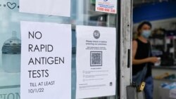 A pharmacy displays a sign to inform customers that Rapid Antigen Test kits are sold out in wake of the coronavirus disease in Sydney, Australia, Jan. 5, 2021.