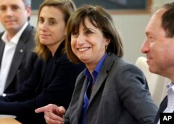 On July 10, 2015, Acting Deputy U.S. Trade Representative Wendy Cutler, second right, talks with Japan's ambassador for economic diplomacy Takeo Mori during their meeting at the Foreign Ministry in Tokyo.