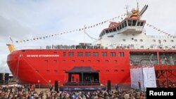 Crowds gather for the naming ceremony of the polar research ship RRS Sir David Attenborough at Cammell Laird shipyard in Birkenhead, Britain, Sept. 26, 2019. (Reuters photo)