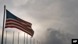FILE - The US flag flies at the US Embassy in Havana, Cuba, March 18, 2019.