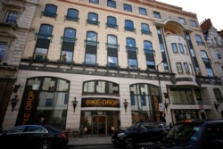 An exterior view of 56-60 Conduit Street in the Mayfair district of London, Monday, Oct. 4, 2021. The property is linked to Azerbaijani President Ilham Aliyev in a new report dubbed the Pandora Papers.