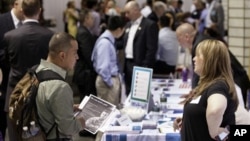 A Delta plane is deiced at Chicago Midway International Airport, in Chicago, Illinois. The bitter weather comes after a heavy snowstorm hit much of the region last week. 