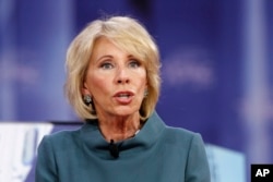 FILE - Education Secretary Betsy DeVos speaks during the Conservative Political Action Conference (CPAC), at National Harbor, Maryland, Feb. 22, 2018.