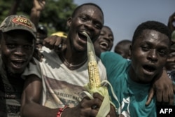 Supporters of Felix Tshisekedi, Democratic Republic of Congo's opposition politician declared winner of the presidential poll, sing and dance ahead of the Constitutional Court final decision on the presidential results, in Kinshasa, Jan. 19, 2019.
