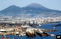 Mt. Vesuvius volcano is seen from the bay of Naples, southern Italy, in this undated file photo.