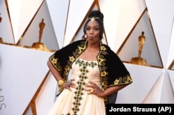 FILE - Tiffany Haddish arrives at the Oscars at the Dolby Theatre in Los Angeles, March 4, 2018.