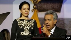 Ecuador's President Lenin Moreno gives a speech, as his wife Rocio Gonzalez listens to him, from the government palace balcony in Quito, Ecuador, May 24, 2017.