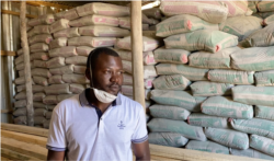 Trevor River, pictured May 16, 2020, sells building materials in one of Harare’s poor townships. He says without government payouts, the lockdown is painful as his income was cut off in March when the lockdown started. (Columbus Mavhunga/VOA)