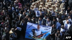 Iranian mourners gather during the final stage of funeral processions for slain top general Qassem Soleimani, in his hometown Kerman, Jan. 7, 2020.