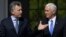 U.S. Vice President Mike Pence, right, walks with Argentina's President Mauricio Macri at the government residence in Buenos Aires, Argentina, Aug. 15, 2017. 