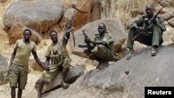 SPLA-North rebel fighters pictured near Jebel Kwo village in rebel-held territory in South Kordofan on May 2, 2012. 