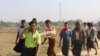 Residents carrying a body of an ethnic Rakhine woman for burial in Rathedaung township after fresh fighting in Rakhine state between the Myanmar military and the Arakan Army, an ethnic Rakhine force, Feb. 21, 2019.