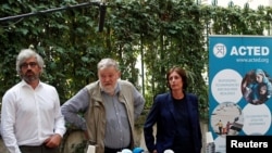 Officials of the French NGO ACTED attend a news conference at the group's headquarters in Paris, August 10, 2020.