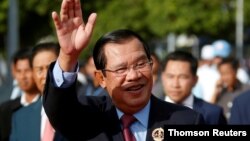 In this photo taken on June 28, 2019, President of the ruling Cambodian People's Party and Prime Minister Hun Sen attends a ceremony to mark the 68th anniversary of the establishment of the party in Phnom Penh, Cambodia.