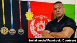 فقید علی رضا آساهی قهرمان دو مرتبه‌ای پرورش اندام جهان