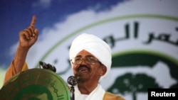 FILE - Ousted Sudanese President Omar Hassan al-Bashir addresses the general conference of the ruling National Congress Party in Khartoum, Oct. 23, 2014.
