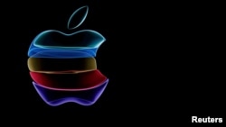 FILE PHOTO: CEO Tim Cook speaks at an Apple event at their headquarters in Cupertino, California, U.S. September 10, 2019. REUTERS/Stephen Lam/File Photo