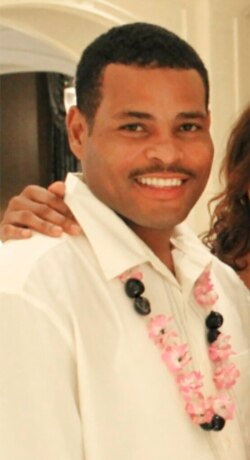 FILE - Ronald Greene smiles in an undated photo provided by his family.