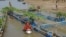 Floating farms where villagers raise fish and ducks and grow vegetables can provide valuable food and income when agricultural land is flooded in northwest Bangladesh during the months-long rainy season. (Amy Yee for VOA)