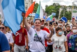 People attend a rally supporting the Khabarovsk region's governor, Sergei Furgal, who was interrogated and ordered to be held in jail for two months, in Khabarovsk, Russia, July 25, 2020.