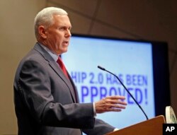 FILE - In this Jan. 27, 2015, file photo, then-Indiana Republican Gov. Mike Pence announces that the Centers for Medicaid and Medicare Services had approved the state's waiver request, called HIP 2.0, during a speech in Indianapolis.