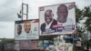 The campaign billboards of Ghana's two main political parties competing in this year's national elections are seen in the streets of Accra in Ghana, Oct. 8, 2016.