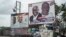 FILE - The campaign billboards of Ghana's two main political parties running in this year's national election are shown in the streets of Accra in Ghana, Oct. 8, 2016.