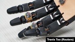 A robotic hand with the AiFoam artificially innervated smart foam is pictured at National University Singapore on June 30, 2021. (REUTERS/Travis Teo)