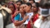 Relatives mourn as they look for a garment worker, who is missing after the collapse of the Rana Plaza building in Savar, outside Dhaka, May 2, 2013. 