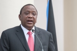 FILE - Kenya's President Uhuru Kenyatta speaks during a press conference in Nairobi, July 1, 2019.