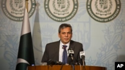 FILE - Pakistan's foreign ministry spokesman Nafees Zakaria briefs the media at the Foreign Office in Islamabad, Pakistan, Sept. 29, 2016. Zakaria alleged Thursday that India has a stockpile of fissile material for the production of nuclear weapons outside IAEA safeguards.