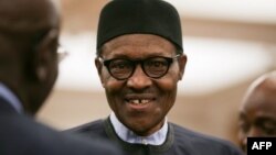 Le président nigérian Muhammadu Buhari assiste à une réception à la séance de clôture du Commonwealth Business Forum au Guildhall, au centre de Londres, le 18 avril 2018, en marge de la réunion des chefs de gouvernement du Commonwealth (CHOGM).