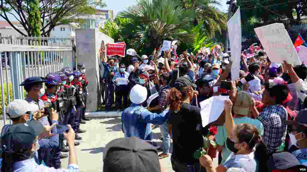 Protesters stage a rally outside the U.S. embassy in Yangon, Feb. 9, 2021, to demand the release of Myanmar civilian leader Aung San Suu Kyi and to reject the military coup. (Credit: VOA Burmese Service)