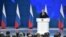 Russian President Vladimir Putin addresses the Federal Assembly, including the State Duma parliamentarians, members of the Federation Council, regional governors and other high-ranking officials, in Moscow, Feb. 20, 2019. 